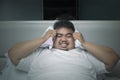 Angry obese man unable to sleep Royalty Free Stock Photo