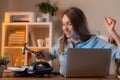 The angry office manager breaking the phone by the hammer at her working place in the office Royalty Free Stock Photo