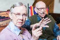 Angry Old Couple in Livingroom Royalty Free Stock Photo