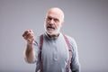 Aged angry man threatin with a punch Royalty Free Stock Photo