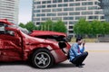 Angry person and damaged car