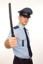 Angry policeman with police baton.