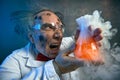 Angry scientist with his failed experiment Royalty Free Stock Photo