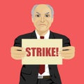 Angry senior businessman holding strike banner