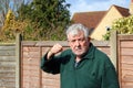 Angry senior man raised fist. Ready to punch. Royalty Free Stock Photo