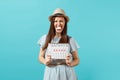 Angry shocked woman in blue dress, hat holding tampon in mouth, female periods calendar for checking menstruation days