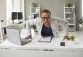 Angry crazy stressed black businesswoman leaning on her office desk and shouting Royalty Free Stock Photo