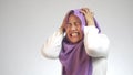 Angry stressed muslim businesswoman shows mad insanity gesture