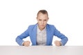 Angry Student with fists on table. Royalty Free Stock Photo