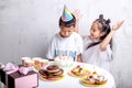 Angry surpised boy isn`t happy to have the little cake Royalty Free Stock Photo