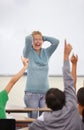 Angry teacher, classroom and shout at kids with raised hand for questions, answer or pop quiz with stress. Teaching Royalty Free Stock Photo