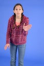 Angry teen girl with braids with hand up