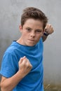 Angry teenager with clenched  fists Royalty Free Stock Photo