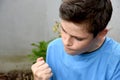 Angry teenager with clenched  fists Royalty Free Stock Photo