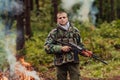 Angry terrorist militant guerrilla soldier warrior in forest