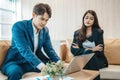 Angry and unhappy asian businesswoman arguing with businessman about work failure at office, Royalty Free Stock Photo