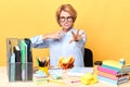 Angry unhappy secretary throwing paper to the camera