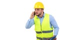 Angry upset young construction engineer yeling at the phone Royalty Free Stock Photo