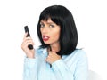 Angry Upset Young Woman Using a Mobile or Chordless Telephone Royalty Free Stock Photo