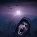 Angry vampire man at night