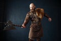 Angry viking with axe, barbarian image