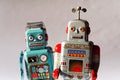 Angry vintage tin toy robots, artificial intelligence, robotic delivery concept Royalty Free Stock Photo