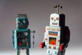 Angry vintage tin toy robots, artificial intelligence, robotic delivery concept