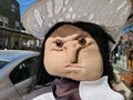 angry witch doll on sidewalk in Salem Massachusetts Royalty Free Stock Photo