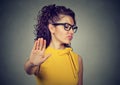 Angry woman with bad attitude giving talk to hand gesture Royalty Free Stock Photo