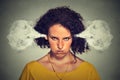 Angry woman, blowing steam coming out of ears Royalty Free Stock Photo