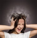 Furious girl with smoke coming from her head