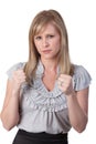 Angry woman with clenched fists