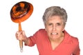 Angry woman with frying pan Royalty Free Stock Photo