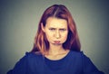 Angry woman, puffing out cheeks about to have nervous breakdown Royalty Free Stock Photo