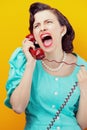 Angry woman screaming on the phone