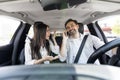 Angry woman shouting while the car driver talking on phone Royalty Free Stock Photo