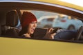 Angry woman shouting on cell phone driving a car Royalty Free Stock Photo