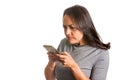 Angry woman texting on her cellphone isolated