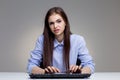 Angry woman using keyboard Royalty Free Stock Photo