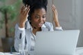 Angry woman worker in headphones microphone talk to client in call center office with frustration Royalty Free Stock Photo