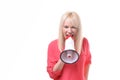 Angry woman yelling into a bull horn Royalty Free Stock Photo