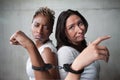 Angry women in handcuffs Royalty Free Stock Photo