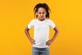 Angry young black girl standing with hands on hips Royalty Free Stock Photo
