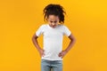 Angry young black teen standing with hands on hips Royalty Free Stock Photo