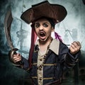 A angry young boy wearing a pirate costume Royalty Free Stock Photo