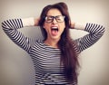 Angry young business woman in glasses strong screaming with wild Royalty Free Stock Photo