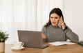 Angry young businesswoman have phone conversation with assistant Royalty Free Stock Photo