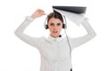 Angry young call center office girl with headphones and microphone looking at the camera and screaming isolated on white Royalty Free Stock Photo