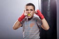 Angry young child boxing Royalty Free Stock Photo