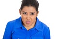 Angry young childish rude bully woman sticking tongue out Royalty Free Stock Photo